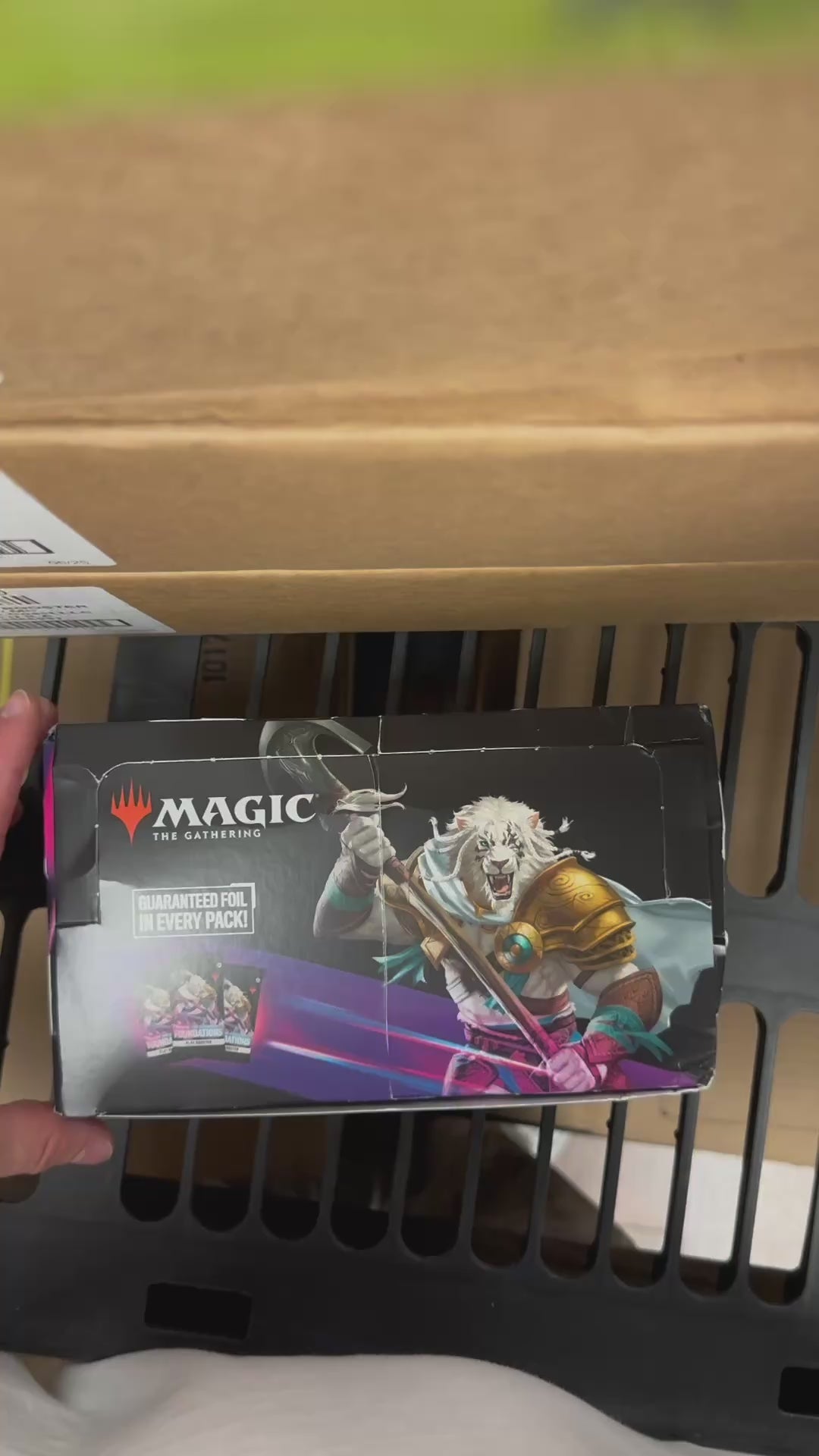 Opening an absolutely destroyed box of Foundations Play Boosters. No cards were damaged.